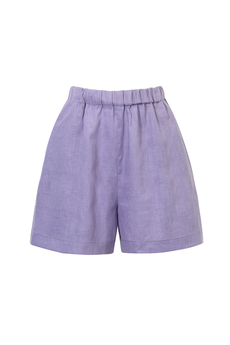 Szorty Franka K model Diune w kolorze fioletowym, wykonane z przewiewnego lnu, z elastyczną gumką w talii i luźnym krojem.
